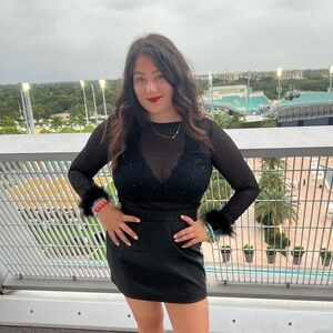 Revolve glitter bodysuit